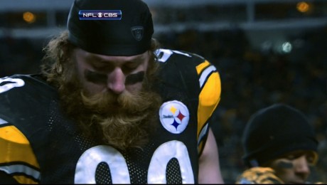 His beard is grinning